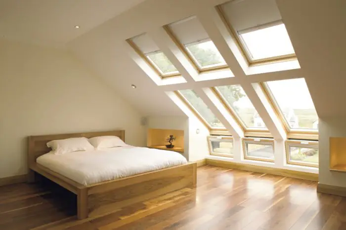 An attic can be converted into a bedroom with the addition of skylights (Bristol-loft-conversions.co.uk)