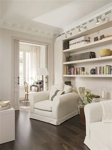 Lounge with armchairs and shelving. A touch of style.