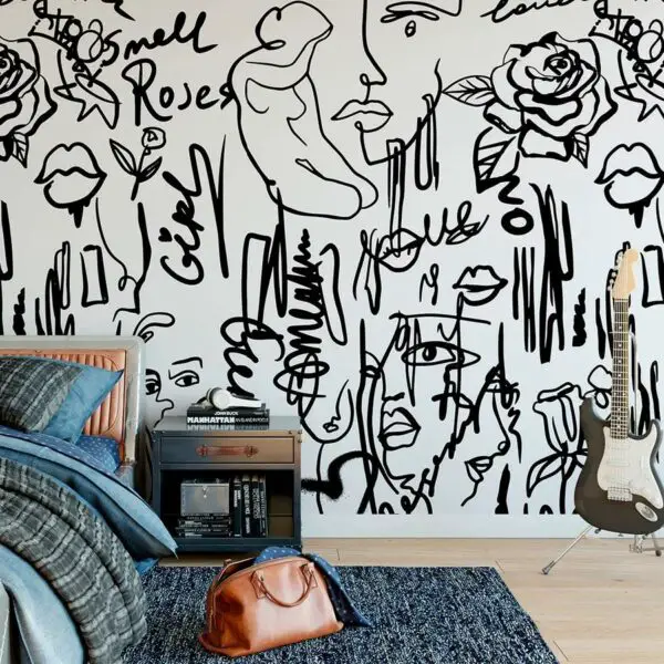  Description: A bedroom with expressive black and white doodles on the wall, perfect for teenagers looking for unique wallpaper ideas to showcase their individuality.